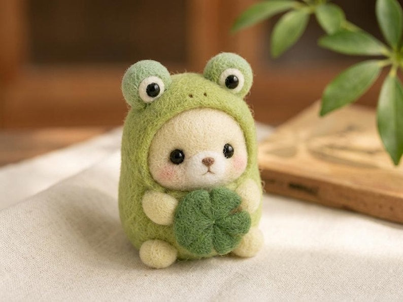 Needle Felted Bear in Frog Costume, Handmade Wool Felt Animal Figurine, Green Frog Onesie with Shamrock