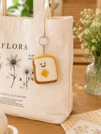 Handmade Wool Felt Smiling Toast Keychain, Yellow Butter Breakfast Bag Charm, Silver-Tone Metal Keyring, 6.5 x 6.5 cm